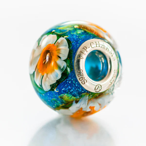 VIP-CHARMS Daffodil Paradise Bead blue; green; white; orange glass Bead by The Alternative Bead. Your official VIP-CHARMS Retailer from Germany