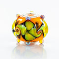 VIP-CHARMS Golden Whimsy Bead orange; green glass Bead by The Alternative Bead. Your official VIP-CHARMS Retailer from Germany