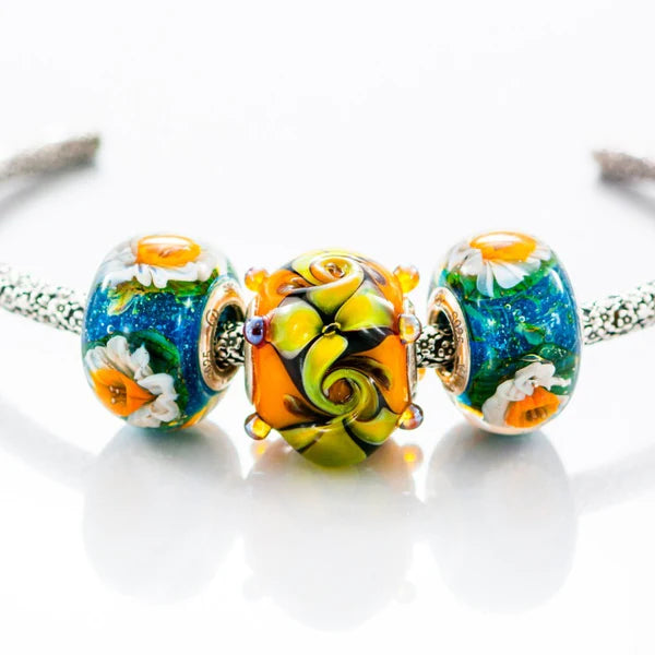 VIP-CHARMS Golden Whimsy Bead orange; green glass Bead by The Alternative Bead. Your official VIP-CHARMS Retailer from Germany