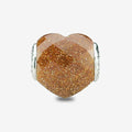 Praan Shimmering Faceted Goldstone Heart Charm gold natural-stone Bead by The Alternative Bead. Your official Praan Retailer from Germany