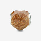 Praan Shimmering Faceted Goldstone Heart Charm gold natural-stone Bead by The Alternative Bead. Your official Praan Retailer from Germany