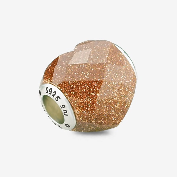 Praan Shimmering Faceted Goldstone Heart Charm gold natural-stone Bead by The Alternative Bead. Your official Praan Retailer from Germany