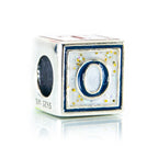 Silver charm with letter 'O' on a white background