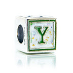 Silver charm with green letter 'Y' on a white background