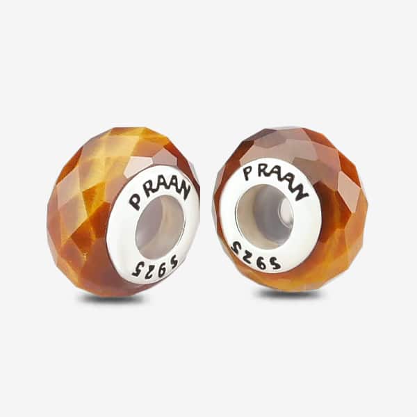 Praan Tiger Eye Stopper Charms brown and bronze and orange natural-stone Stopper by The Alternative Bead. Your official Praan Retailer from Germany