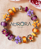 Aurora Charm Purple Dream Lily Charm silver; purple sterling-silver; enamel Bead by The Alternative Bead. Your official Aurora Charm Retailer from Germany
