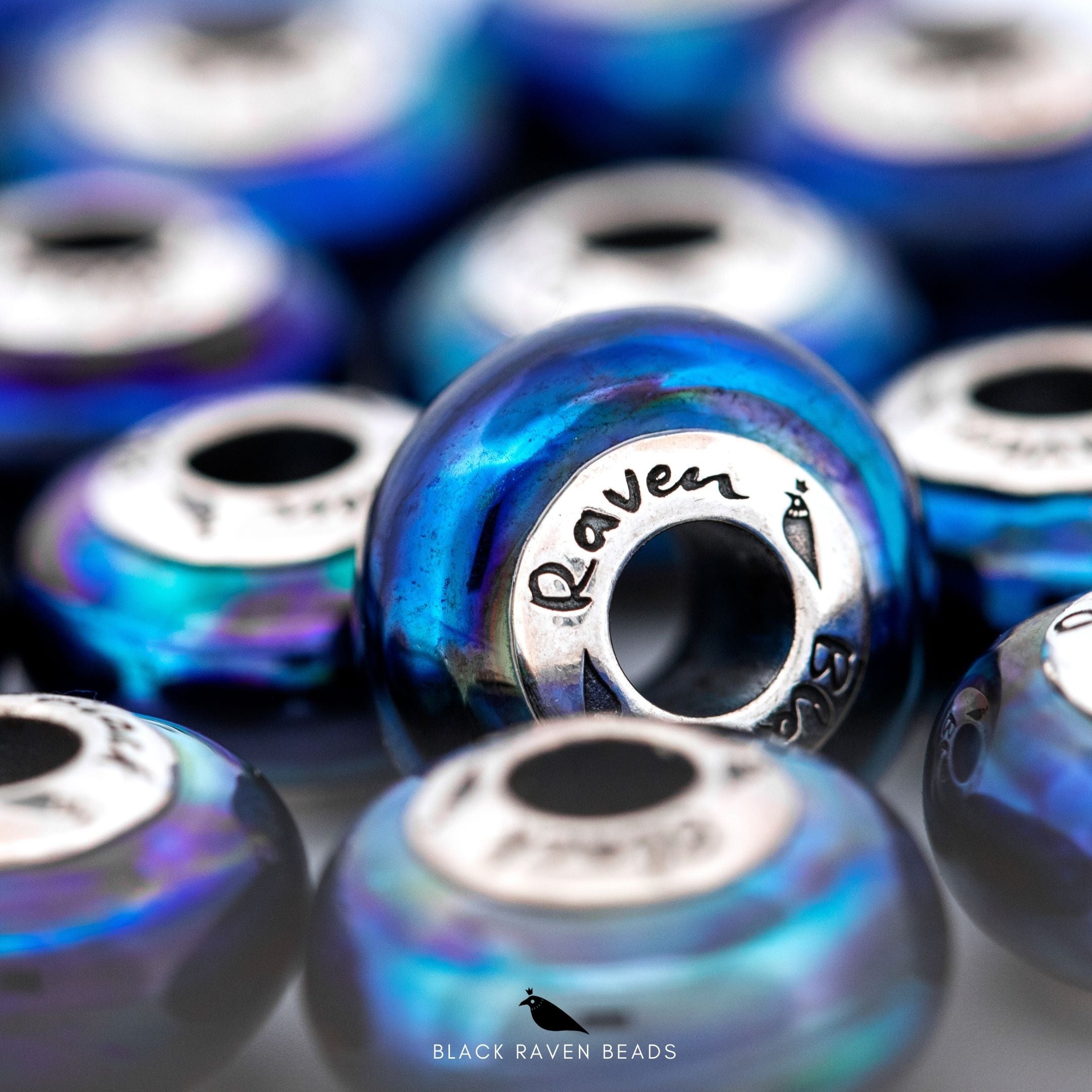 Black Raven Beads Raven Spirit blue glass Charm by The Alternative Bead. Your official Black Raven Beads Retailer from Germany