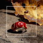 Black Raven Beads Twirling Leaves red and gray glass Charm by The Alternative Bead. Your official Black Raven Beads Retailer from Germany