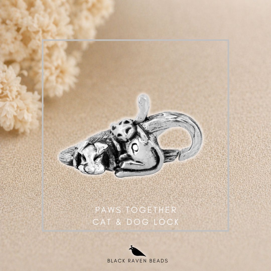 Black Raven Beads Paws Together Cat & Dog Lock silver sterling-silver Lock by The Alternative Bead. Your official Black Raven Beads Retailer from Germany