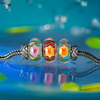Elfbeads Phoenix Lotus Dance silver glass Bead by The Alternative Bead. Your official Elfbeads Retailer from Germany