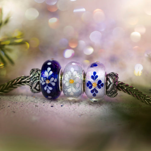 Elfbeads Glistening Snowpetals white glass Bead by The Alternative Bead. Your official Elfbeads Retailer from Germany
