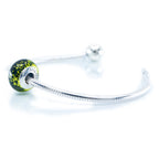 Aurora Charm Dew of the Deep Woods Murano Glass Bead green; yellow; black glass Bead by The Alternative Bead. Your official Aurora Charm Retailer from Germany