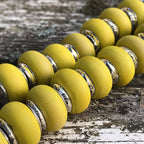 Black Raven Beads Curry yellow glass Charm by The Alternative Bead. Your official Black Raven Beads Retailer from Germany