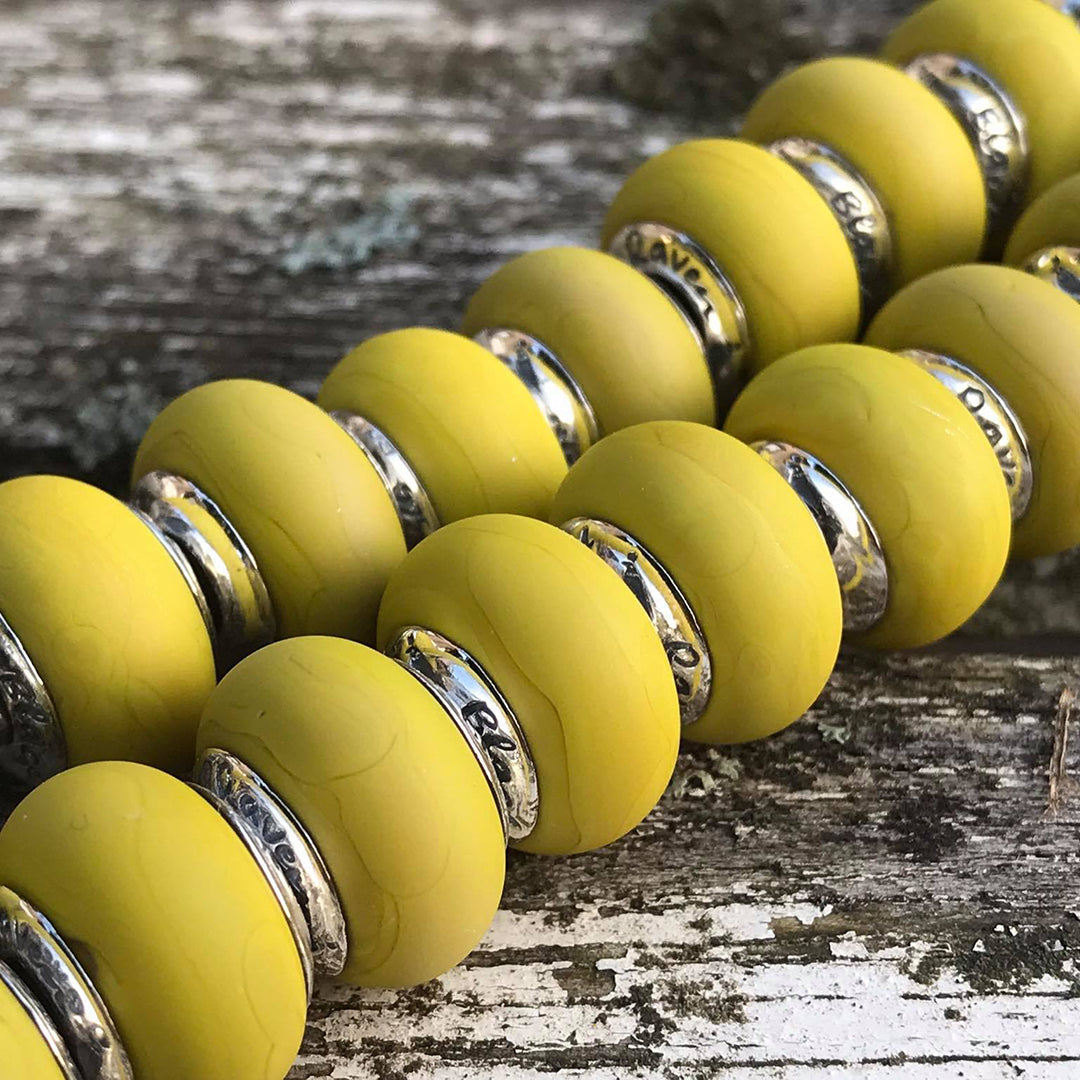 Black Raven Beads Curry yellow glass Charm by The Alternative Bead. Your official Black Raven Beads Retailer from Germany