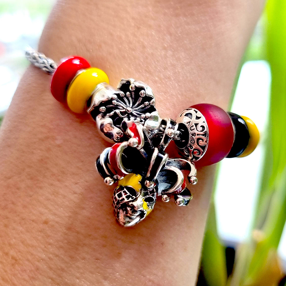 Aurora Charm Leonardo Venetian Mask silver; red; yellow; black sterling-silver; enamel Dangle by The Alternative Bead. Your official Aurora Charm Retailer from Germany