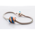 VIP-CHARMS Azure Sands Bead blue; beige; brown glass Bead by The Alternative Bead. Your official VIP-CHARMS Retailer from Germany